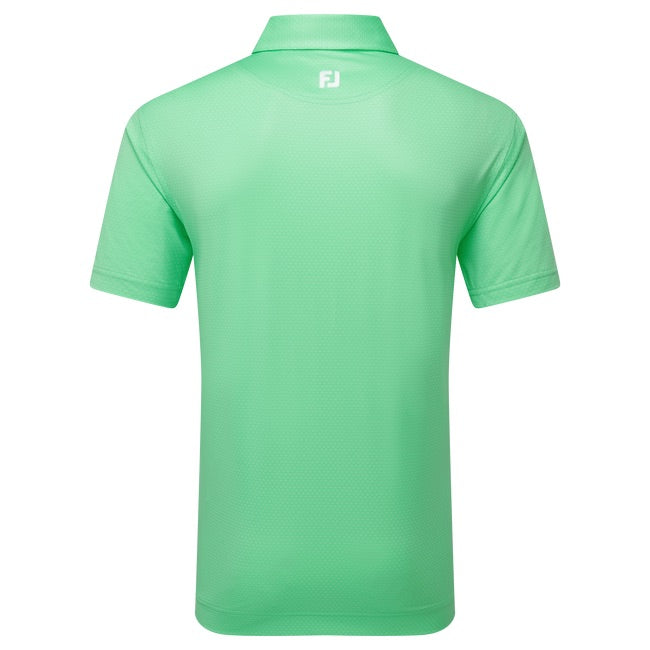 Green polo shirt with a brand logo on the back against a white background