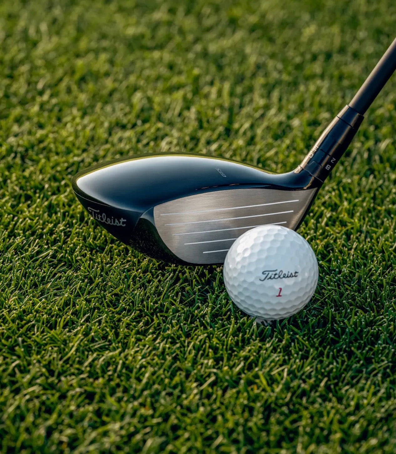Titleist GTS fairway wood with addressing a Titleist Pro V1 golf ball