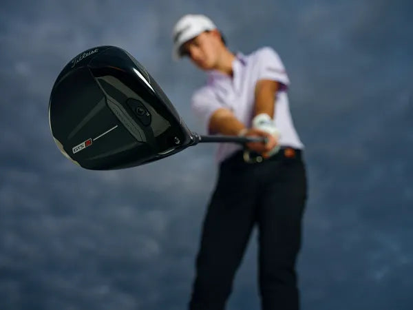 Golfer Hitting a Titleist GTS Driver