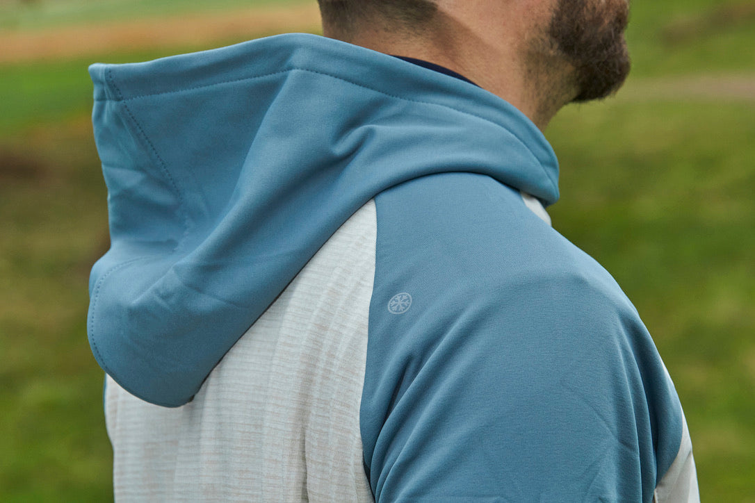 New winter golf clothing, image of model wearing a new FootJoy Golf Winter Hoodie