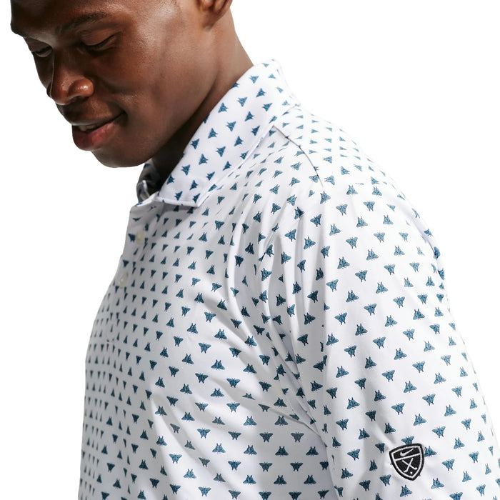 Nike Par Butterfly Print Dri-FIT men's golf polo in white with blue butterfly pattern and sleeve logo, side view.
