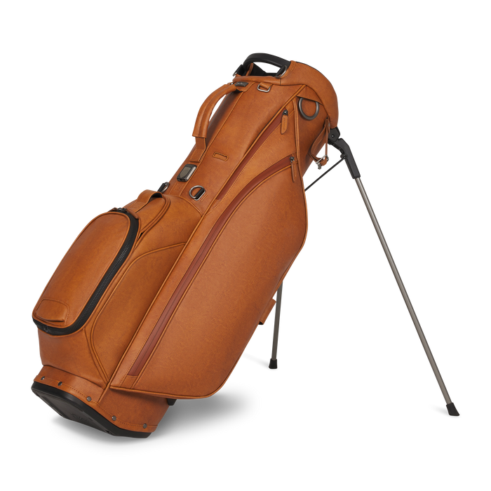 A brown leather golf Titleist LINKSLEGEND Classic Members II Golf Stand Bag with black trim and a silver metal stand leg, shown on a clean white background.