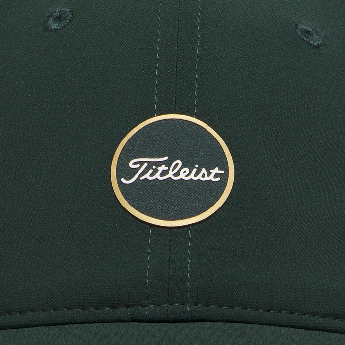 close up of logo on the green and gold Titleist Limited Edition Tee Time Collection Montauk Lightweight Hat