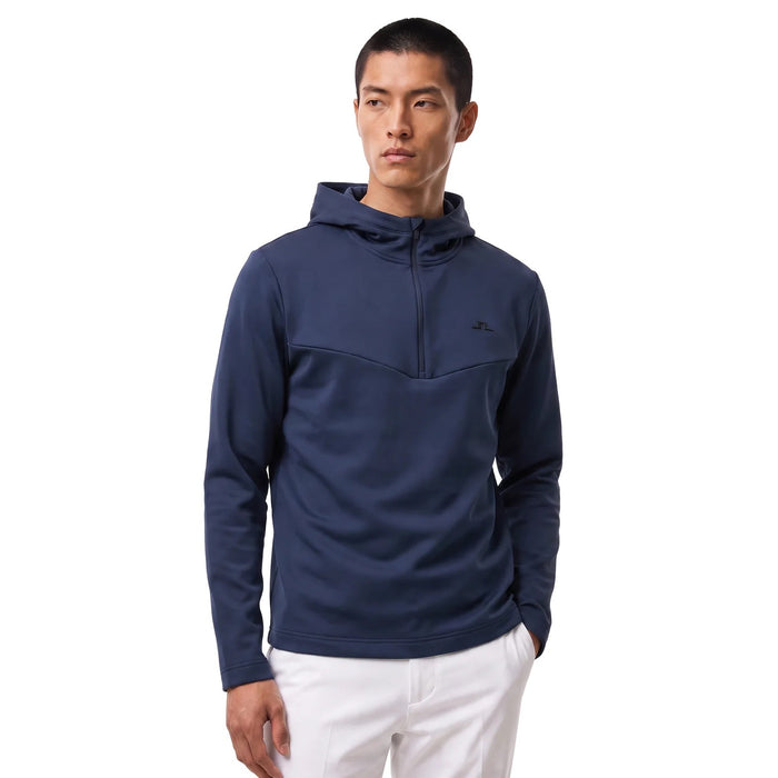 J.Lindeberg Maclean navy quarter zip golf hoodie with a hood and chest logo, front view.