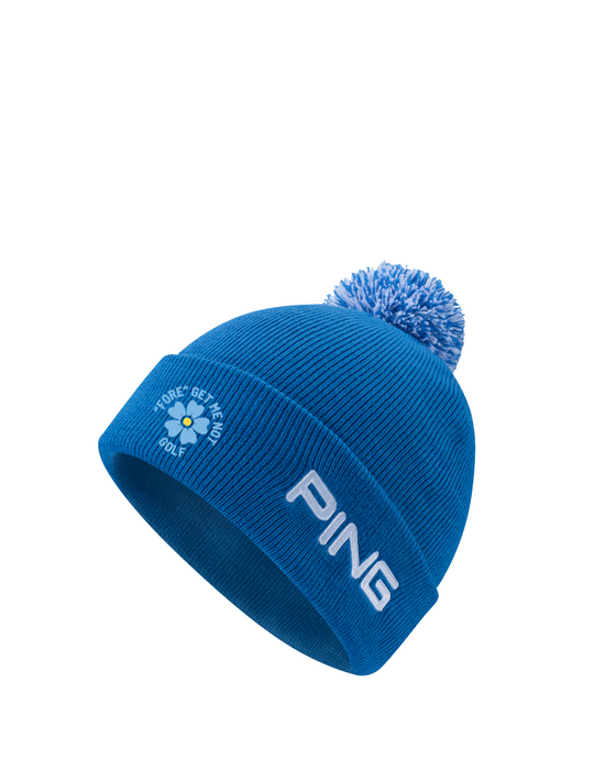PING Cresting Knit Fore Get Me Not golf beanie in tidal blue with white logo, floral embroidery, and a pom-pom.