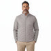 Front view of a titanium grey Under Armour Drive Pro insulated golf jacket with a quilted chest and zip-up collar.
