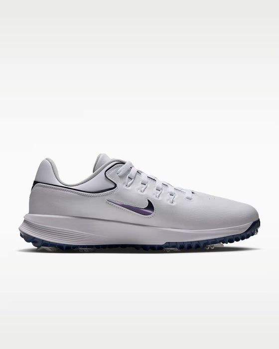Nike Victory Pro 4 golf shoes in white with a purple swoosh, side view featuring a spiked blue sole.