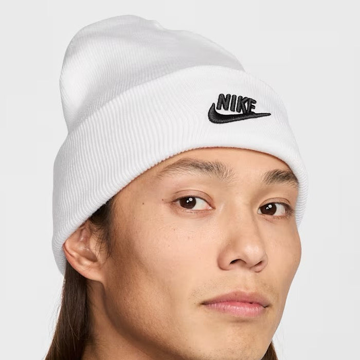 Nike Peak Futura unisex ribbed beanie in white with a black embroidered Nike logo on the front cuff.