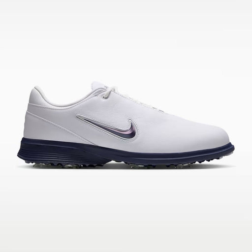 Nike Victory Tour 4 golf shoes in white and midnight navy, side view featuring a sleek leather design and spiked sole.