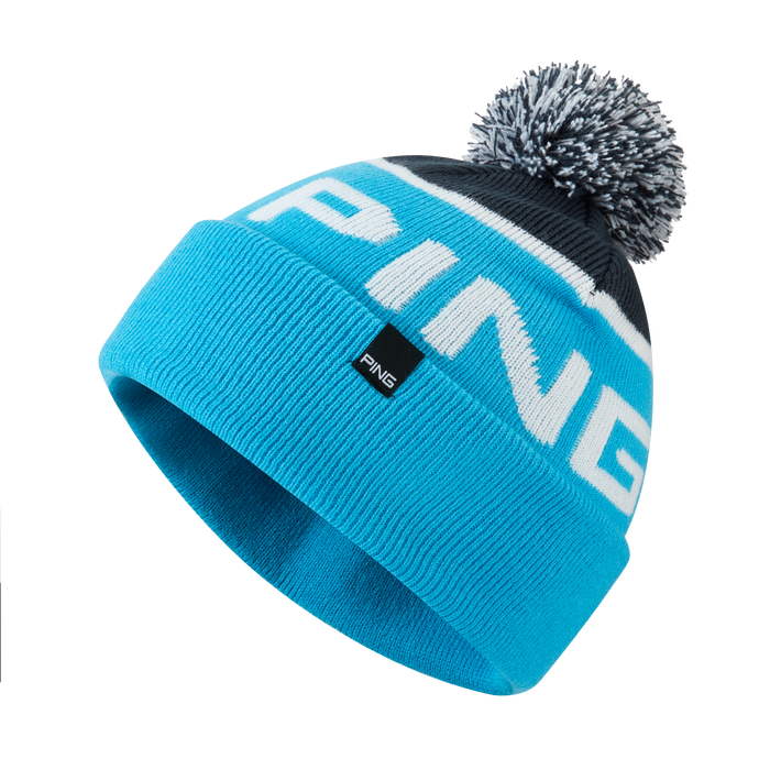 PING Anderson bobble golf hat in cyan, white, and black with a knitted design and branded front tab, side view.
