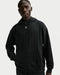 Front view of a black Nike Fairway Fresh oversized golf hoodie with vertical ribbed texture and a small chest logo.