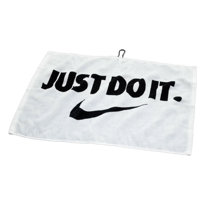 Nike Performance Golf Towel 2.0 in white, featuring a black Just Do It slogan and Swoosh logo with a metal attachment hook.