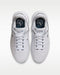 Top-down view of white Nike Victory Pro 4 golf shoes with lace-up closure and branded insoles.
