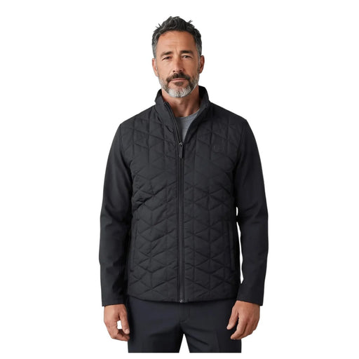 Front view of a black Under Armour Drive Pro insulated golf jacket with a quilted chest and full-zip design.