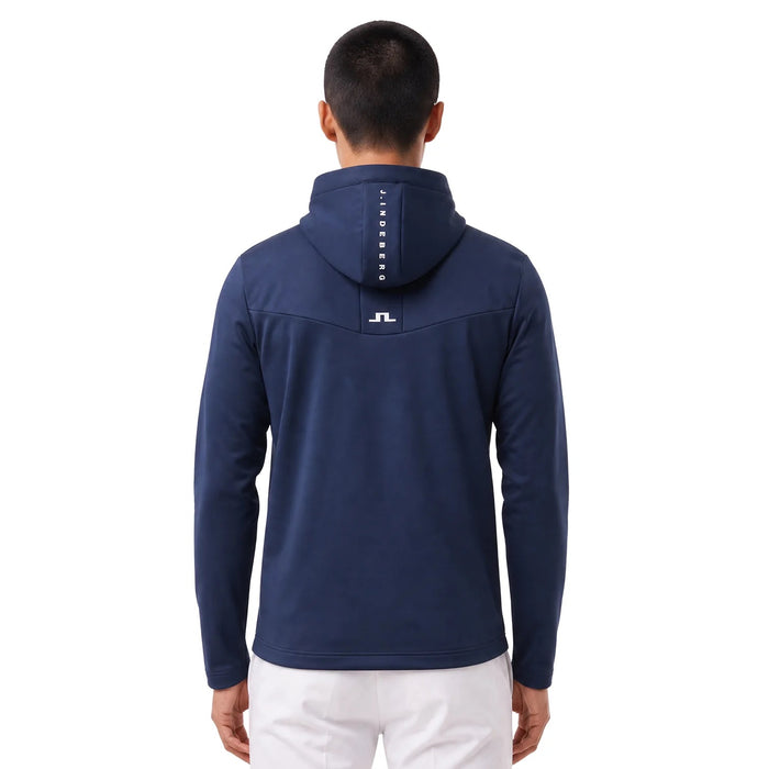 Back view of navy blue J.Lindeberg Maclean quarter zip golf hoodie with branded hood detail and white logo.