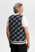 J.Lindeberg Anton Jacquard Knitted Vest in navy with beige JL pattern on male model facing away