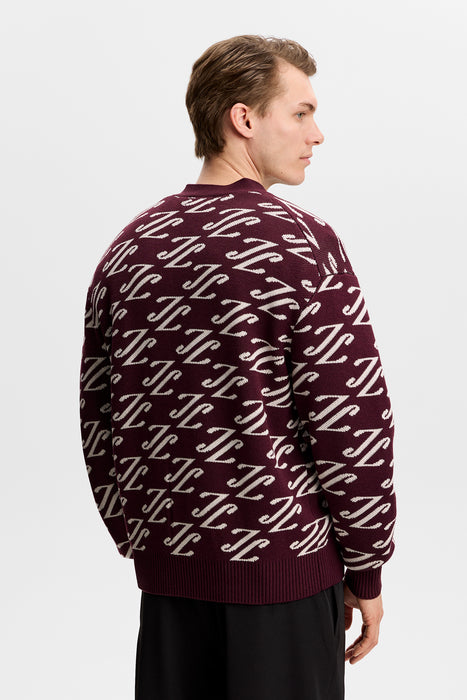 J.Lindeberg Denny Jacquard Knitted Cardigan in maroon/burgundy on model with all over JL pattern