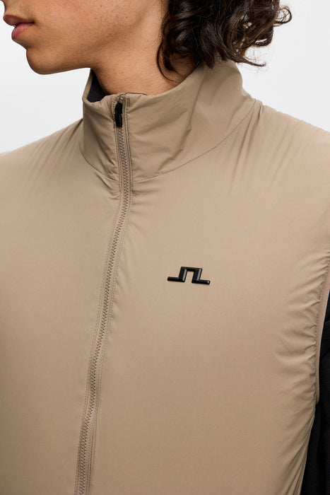 close up of logo on the J.Lindeberg Clinton Padded Golf Vest in brindle