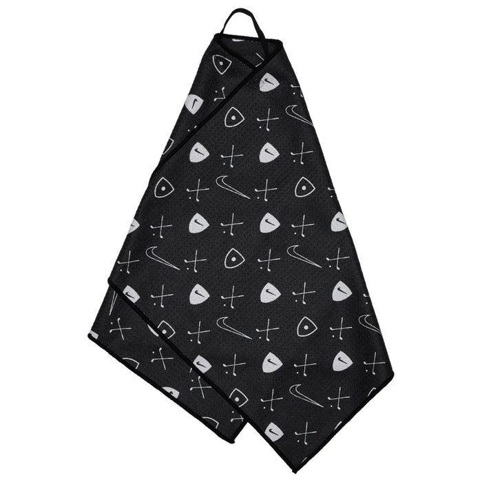 Nike Caddy Golf Towel 2.0 in black with a white patterned print of golf clubs and Swoosh logos, featuring a hanging loop.