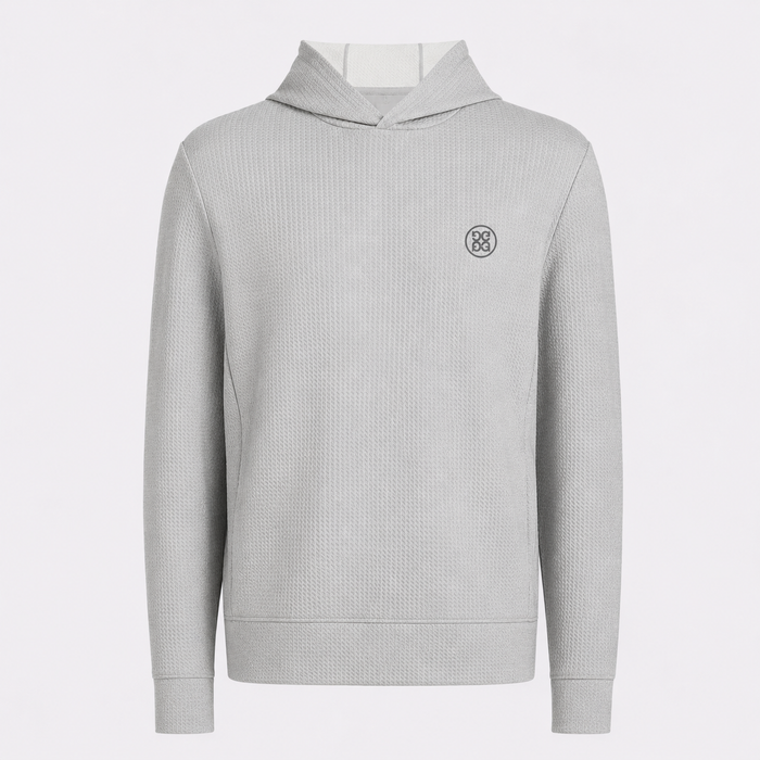 A light grey waffle-knit G/FORE Pebble Quilted Men's Golf Hoodie with a small black circular logo on the left chest, displayed on a clean white background.
