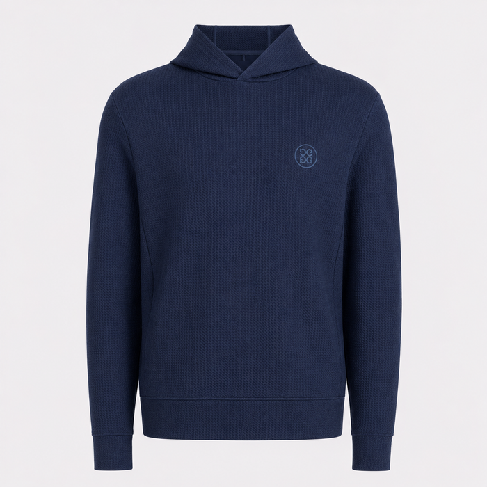 A navy blue G/FORE Pebble Quilted Men's Golf Hoodie with a small embroidered circular logo on the left chest, displayed on a clean white background.