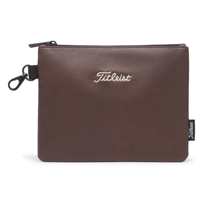 Titleist Birthplace of Golf zippered valuables pouch in brown leather with white embroidered logo and side clip.