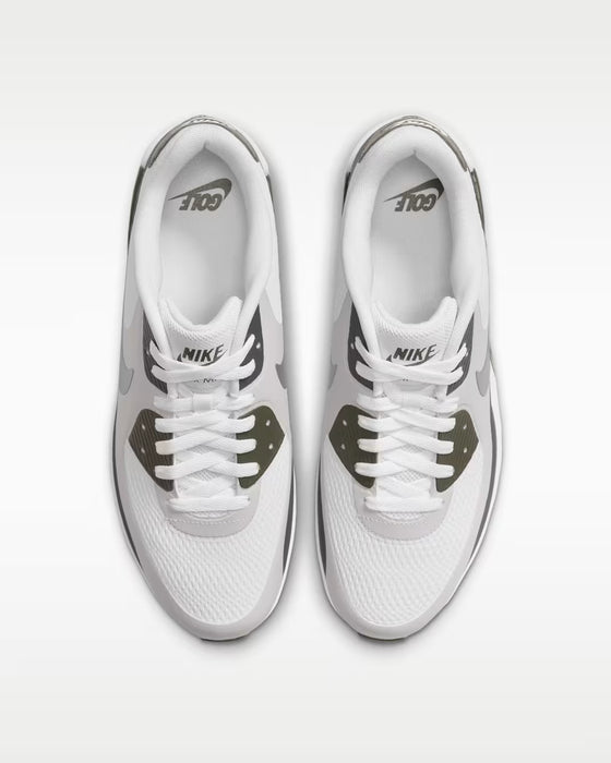 Top-down view of white and olive green Nike Air Max 90 Golf shoes with mesh uppers and lace-up fastening.