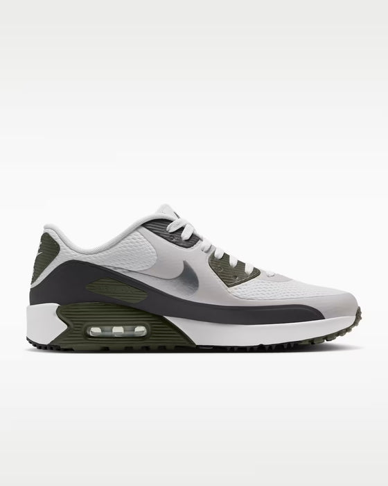 Side view of Nike Air Max 90 Golf shoes in white and olive green with a metallic silver swoosh and visible air unit.