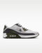 Side view of Nike Air Max 90 Golf shoes in white and olive green with a metallic silver swoosh and visible air unit.