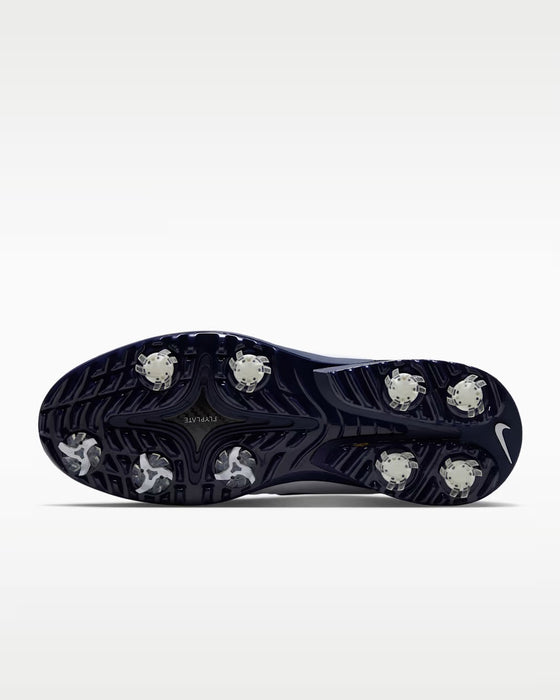 Nike Victory Tour 4 golf shoe, bottom view showing the dark navy spiked sole with white traction cleats.