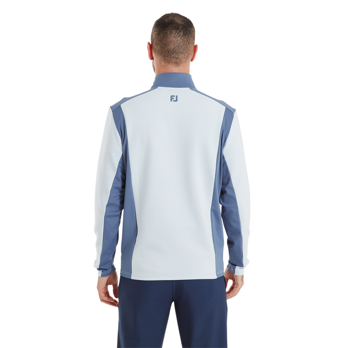 Back view of FootJoy ThermoSeries Blocked Golf Midlayer in light grey and navy blue with a high collar and FJ logo.