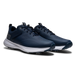 FootJoy Qualifier men's spiked golf shoes in navy blue with a white midsole and perforated synthetic upper, side view.