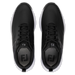 Top-down view of black FootJoy Qualifier men's spiked golf shoes with white soles and perforated detailing.