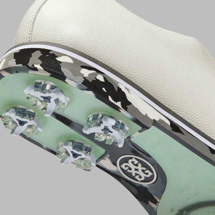 G/FORE Gallivanter G/LOCK Camo Sole Golf Shoes in white with charcoal camo. View of the sole glock system