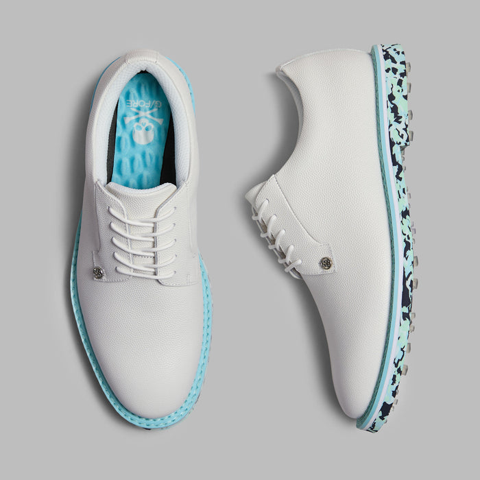 G/FORE Gallivanter Camo Sole Leather Spikeless Golf Shoes in white and blue camo. View of the pair from above