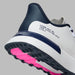 G/FORE G.112 Spikeless Golf Shoes in white and navy, close up on heel showing pink sole