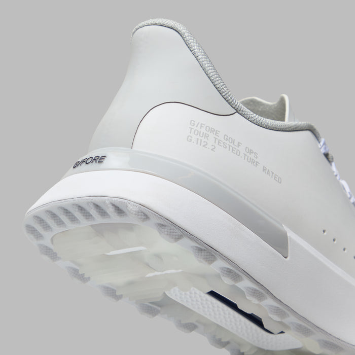 G/FORE G.112 Camo Spikeless Golf Shoes in white and grey, close up of the heel