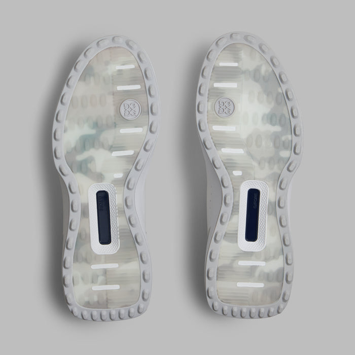 G/FORE G.112 Camo Spikeless Golf Shoes in white and grey, showing the camo sole of the pair