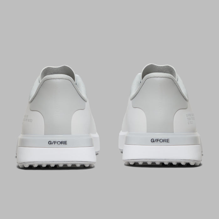 G/FORE G.112 Camo Spikeless Golf Shoes in white and grey, view of the heels of the air of shoes