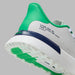 G/FORE G.112 Embossed Skull & Tees Spikeless Golf Shoes in white with green and navy accents, close up of the heel