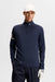 J.Lindeberg Heath Strike Quarter Zip Golf Mid Layer in jl navy on model close up