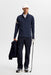 J.Lindeberg Heath Strike Quarter Zip Golf Mid Layer in jl navy, on model holding golf club