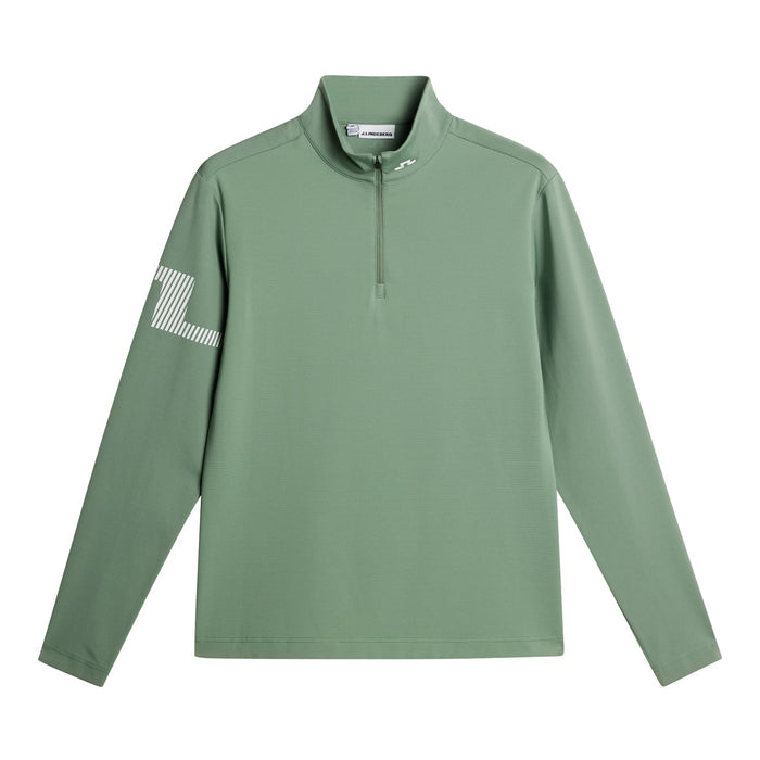 J.Lindeberg Heath Strike Quarter Zip Golf Mid Layer in hedge green showing the full view of the front of the garment, clearly seeing the JL logos