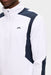 J.Lindeberg Lukas 1/4 Zip Golf Mid Layer in white and navy showing close up of chest JL logo