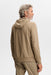 J.Lindeberg Vent Golf Hoodie on male model in brindle beige