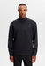 male model wearing J.Lindeberg Lassy Quarter Zip Golf Mid Layer in black