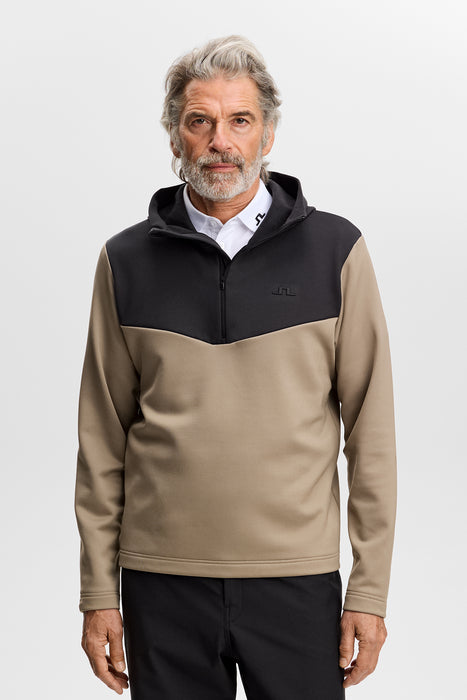 J.Lindeberg Maclean Quarter Zip Golf Hoodie on a male model
