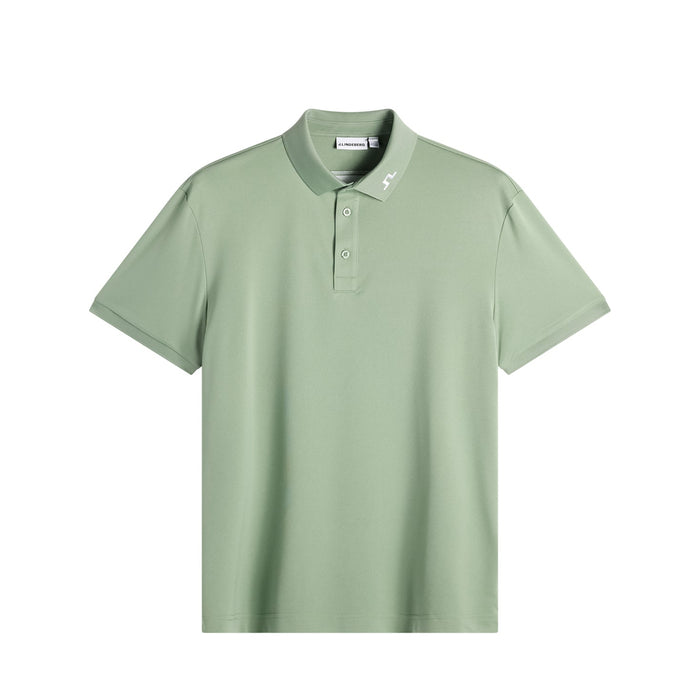 J.Lindeberg KV Golf Polo Shirt in green showing plain front with JL logo on collar
