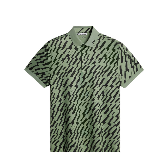 J.Lindeberg Lukas 1/4 Zip Golf Mid Layer 2026 in oak green. Shoeing the front of the polo shirt and black pattern