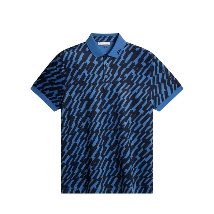 J.Lindeberg Tour Tech Print Golf Polo Shirt  in oak federal blue. Blue and black stripe print all over showing the front
